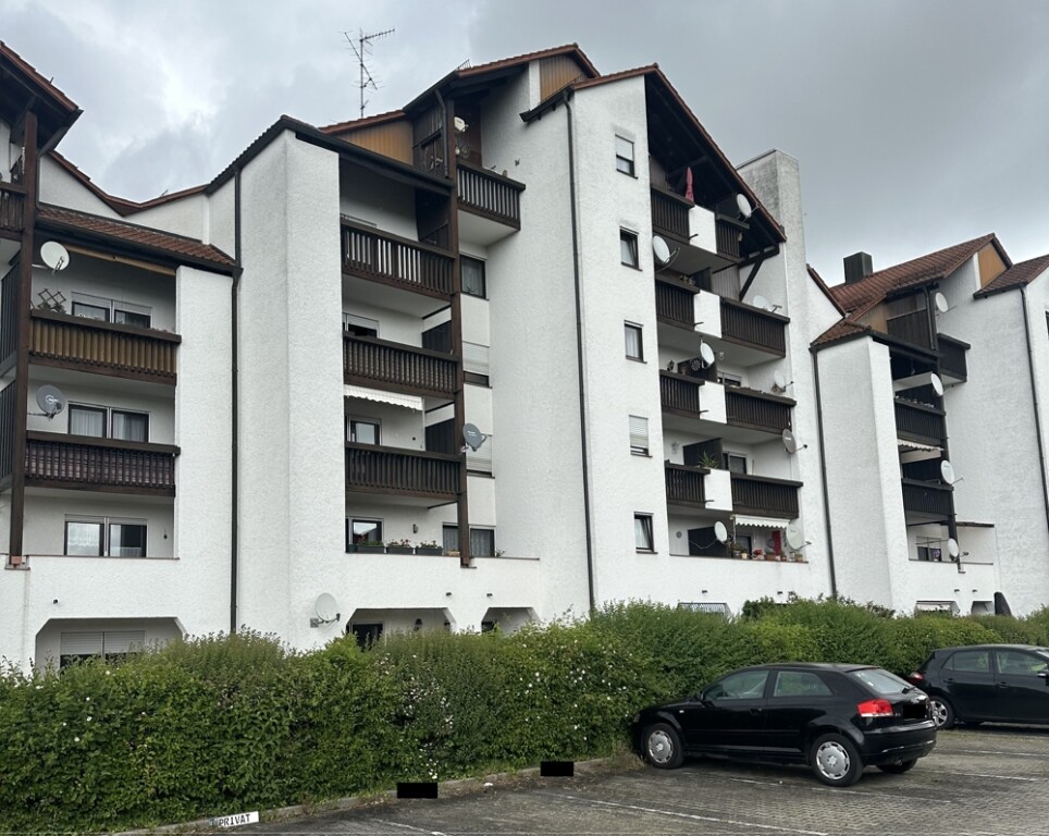 Vermietete 2-Zimmer-Wohnung mit Balkon & Tiefgarage in ruhiger Siedlungslage